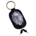 Portachiavi vintage in pelle con teschio pirata e corda di cotone con perline decorative - Nero