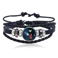 Black leather Scorpio zodiac multi-layer bracelet with luminous gemstone on white background - Scorpio