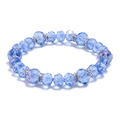 Pulsera minimalista de cristal azul claro con cuentas espaciadoras de plata y pedrería - Azul claro