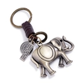 Porte-clés éléphant vintage avec cuir tressé et citation gravée sur fond blanc - Style Éléphant / Bronze/Marron