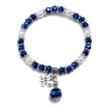 Boho-Perlenarmband mit dunkelblauen Kristallen, Perlen und Schmetterlingsanhänger - Blau