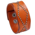 Vintage orange-brown wide leather bracelet with grey metal rivets in X pattern - Tan