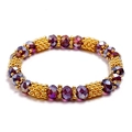 Elastic beaded bracelet with multifaceted purple crystal beads and golden spacers - Purple