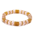 Pink faceted crystal beads and golden textured metal beads elastic bracelet for women - Pink