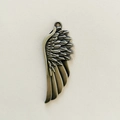 Vintage antique silver wing pendant charm in woven leather keychain style for DIY projects - Wing