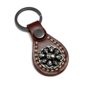 Porte-clés en cuir marron fait main avec relief de crâne et couture blanche - Marron