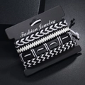 Set di quattro bracciali punk multistrato in pelle con trame intrecciate in bianco e nero - Stile Bianco e Nero (TZ682)