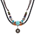 Collana multistrato in pelle stile boho con perline turchesi e ciondolo moneta antica - Nero