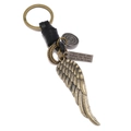 Portachiavi vintage in pelle intrecciata con ciondolo a piuma in bronzo e targa incisa - Nero