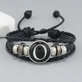 Detail of multi-layer black braided leather bracelet with silver letter O charm and beads - Letter O