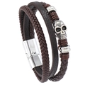 Bracciale multistrato in pelle intrecciata da uomo con teschio e chiusura magnetica - Marrone