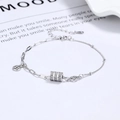 Bracciale in argento 925 con cilindro di cristalli e catena a maglie asimmetriche - Argento 925 / Oro Bianco