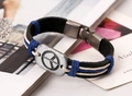 Detailed shot of bohemian braided leather bracelet with silver peace sign charm - Peace Symbol Style (20.7cm) / Black Men's Style
