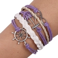 Pulsera trenzada multicapa hecha a mano con dijes vintage de ancla e infinito - Estilo de Dije de Ancla y Timón Náutico / Púrpura y Blanco