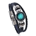 Detail of multi-layer Cancer zodiac bracelet with black woven leather and glass dome charm - Cancer