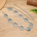 Catena da vita bohémien in metallo argento con pietre turchesi su legno vintage - Argento