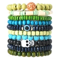 Set de pulseras bohemias multicapa con cuentas de madera coloridas y dijes calavera - Colección Estilo Bohemio