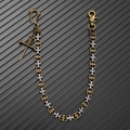 Dettaglio della catena per pantaloni con croci gotiche, teschio e moschettone - Bicolore B (Ciondolo Bronzo Antico)