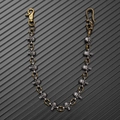 Close-up of gothic skull pants chain with antique silver and bronze metal links - Two Colors