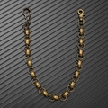 Dettaglio delle maglie a teschio in bronzo retrò e chiusura a moschettone della catena punk - Bronzo