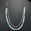 Dettaglio catena con turchese e perle sintetiche e maglie metalliche a spirale d'argento - Argento
