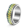 Macro detail of rotating fidget ring with gold olive leaves on deep blue base - US 6 / Silver Base Gold Leaf