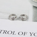 Minimalist S925 sterling silver star hoop earrings featuring a bright round cubic zirconia - 925 Silver / White Gold