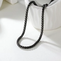 Polished gunmetal stainless steel box chain necklace displayed on a ceramic bowl - Black 50cm*3mm