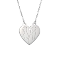Detailed view of silver heart pendant featuring split boy and girl silhouette engraving - Lovers 2