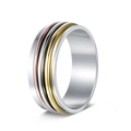 Detailed view of three-tone stainless steel spinner ring with rotating gold and silver bands - US 7 / Silver Gold Rose Gold Bands