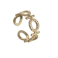 Detail of adjustable gold-plated titanium ring with X and O cutout patterns and beaded edges - Gold
