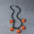 Halloween necklace with black chunky chain and five orange Jack-O-Lantern pumpkin charms - Necklace