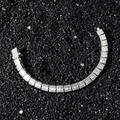 Silver iced-out tennis bracelet with square-cut zirconia on black stone background - 20 CM / Silver