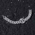 Bracciale hip hop argento con medaglione a teschio e cristalli su base nera professionale - Teschio Rotante / Argento