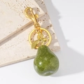 Portachiavi a pera in resina verde con glitter dorati e chiusura a moschettone in oro - Oro