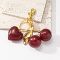 Sparkly resin cherry and heart keychain with polished gold hardware and leaves - Gold