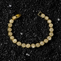 Luxury 8mm gold tennis bracelet with brilliant round-cut crystals on black background - Round Cut Spliced Style / Gold