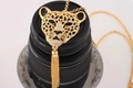 Gold-plated leopard head pendant necklace with rhinestones and elegant long tassels - Gold