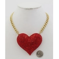 Vintage gold chunky chain necklace with a large red rhinestone heart pendant on a bust - Red