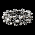 Vintage silver alloy leaf bracelet with white pearls and rhinestones on black background - Silver