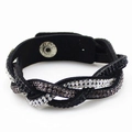 Dettaglio del bracciale intrecciato in velluto nero con strass bianchi e neri scintillanti - Nero