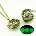 Collana vintage con ciondolo a cuore traforato luminoso e finitura in bronzo - Bronzo Antico Luce Verde (YJ10-6072)