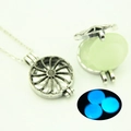 Detailed view of hollow peace sign pendant with glowing blue bead inside and silver chain - Geometric Hollow-Blue Light