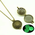 Detail of vintage hollow pendant with green luminous stone in dark light and open structure - Green Glow (YJ10-6109)