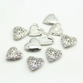 Ciondolo medaglione a cuore d'argento con motivo a filigrana e finitura lucida - 2.6cm*0.6cm*2.4cm / Argento
