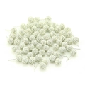 Macro shot of 10mm candy-colored Shamballa earrings with sparkling white crystals - White