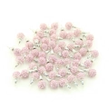 Detailed close-up of light pink crystal pave ball stud earrings in bulk display - Pink