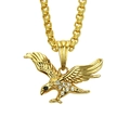 Collana con ciondolo ad aquila dorata e strass scintillanti su fondo bianco - Oro (Occhi Neri)