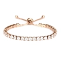 Macro detail of rose gold tennis bracelet with 4mm cubic zirconia and adjustable slide clasp - Rose Gold