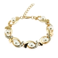 Elegant gold pearl bracelet with S-shaped metal links and sparkling rhinestone details - Gold